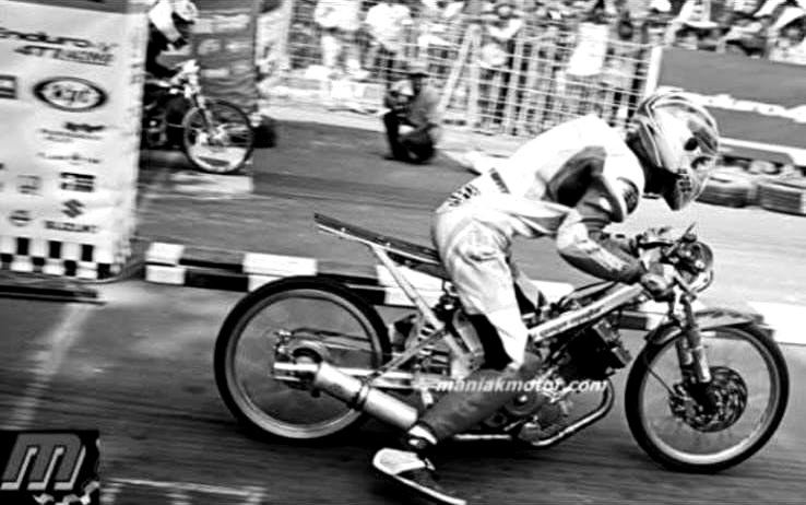 Drag bike racing down the track, 2014