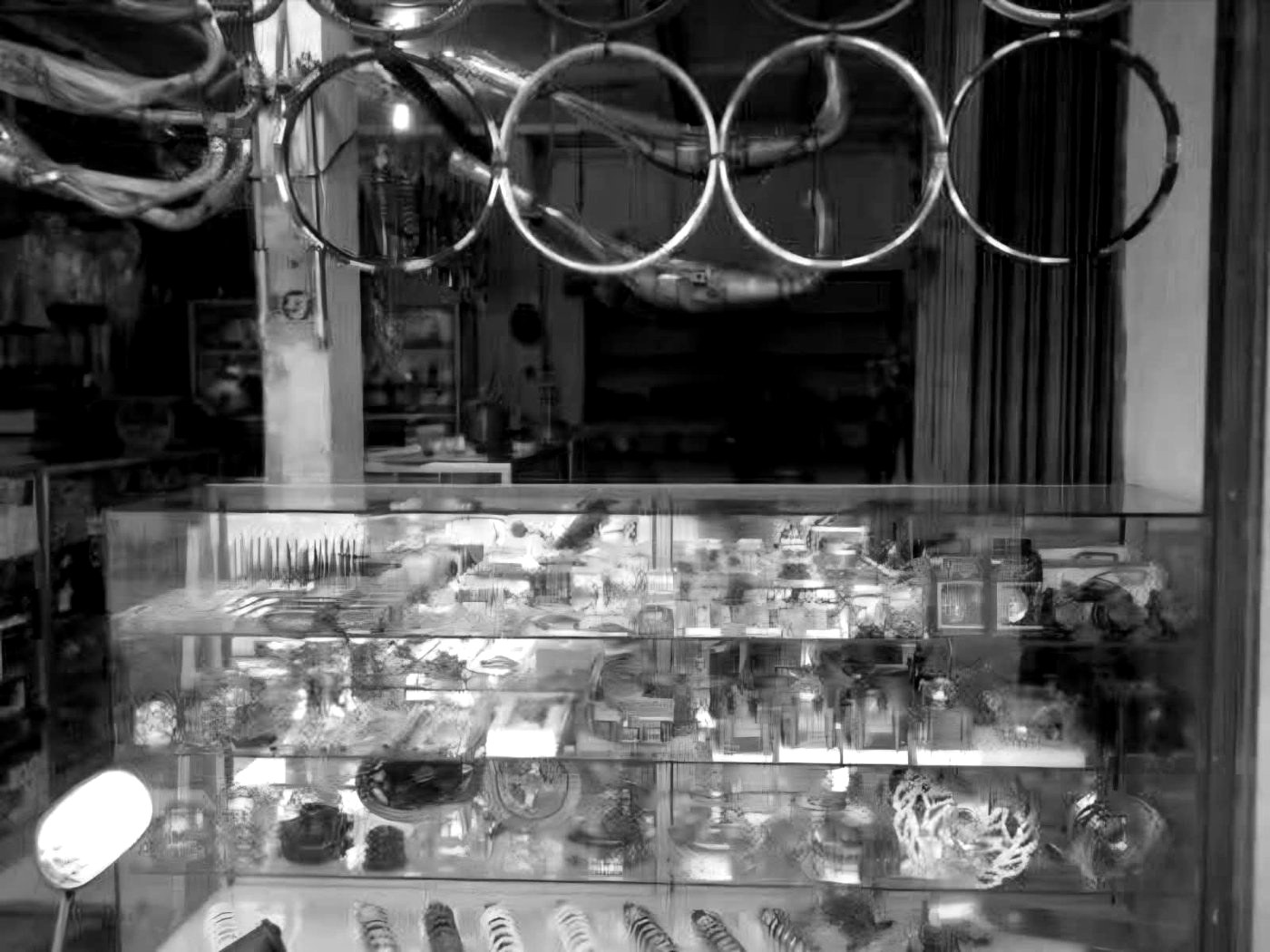 Inside the shop: parts display cases and wheel rims